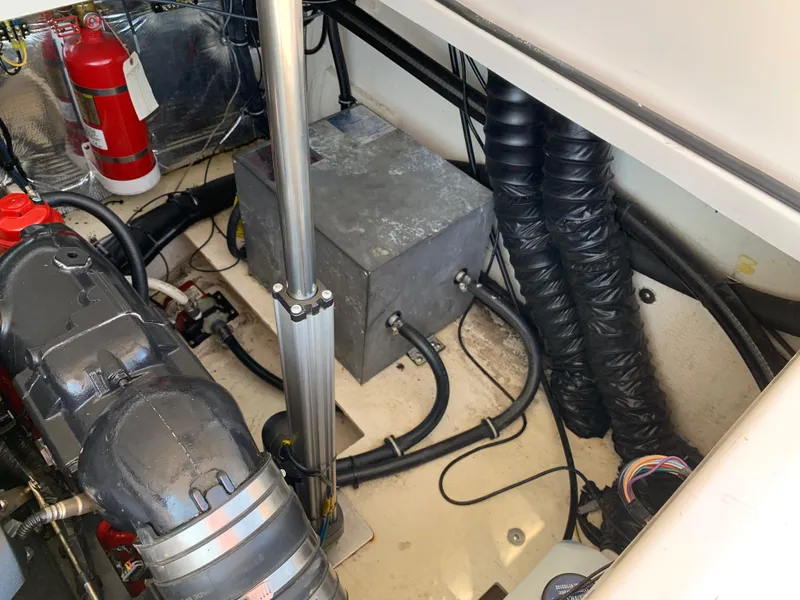 Slide: The Image of Engine compartment of 2018 Regal 28 Express with fire extinguisher. - 30