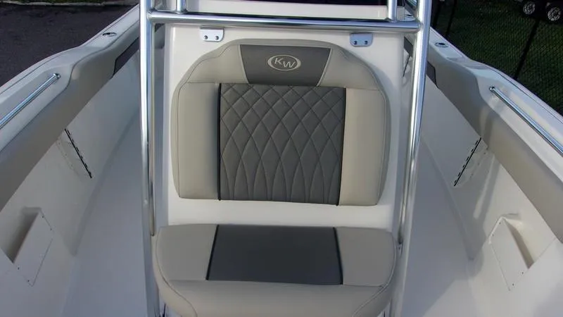 Slide: The Image of 2025 Key West 239 FS boat seat with quilted design and KW logo. - 11