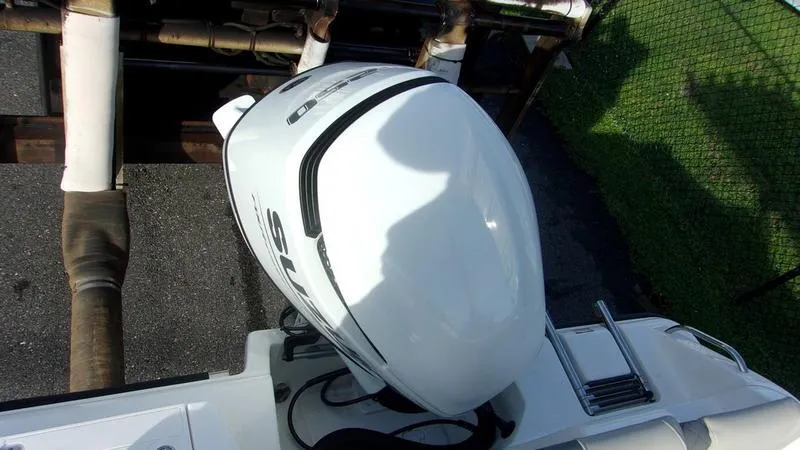 Slide: The Image of Top view of a 2025 Key West 239 FS boat engine. - 6