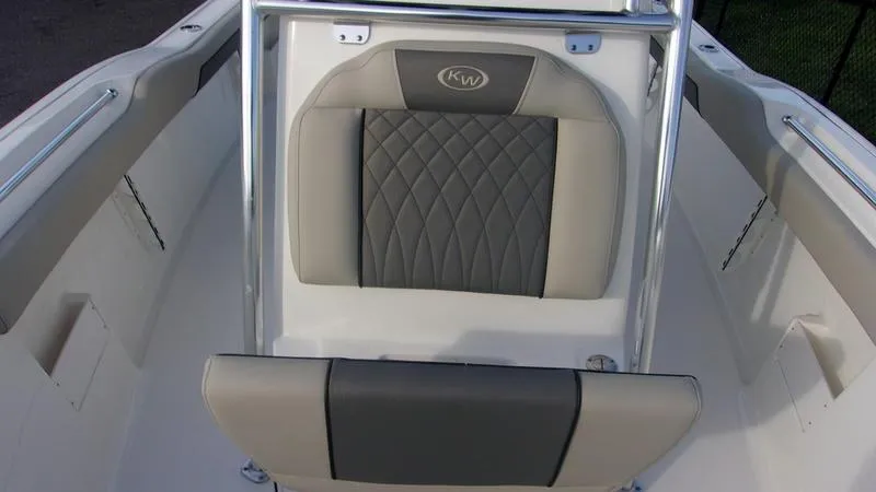 Slide: The Image of 2025 Key West 239 FS boat seat with quilted design and sturdy frame. - 9