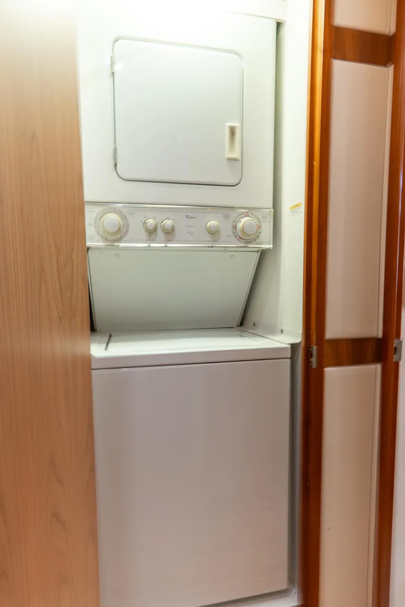 Slide: The Image of Stacked washer and dryer in 2010 Hatteras GT60 yacht interior. - 47