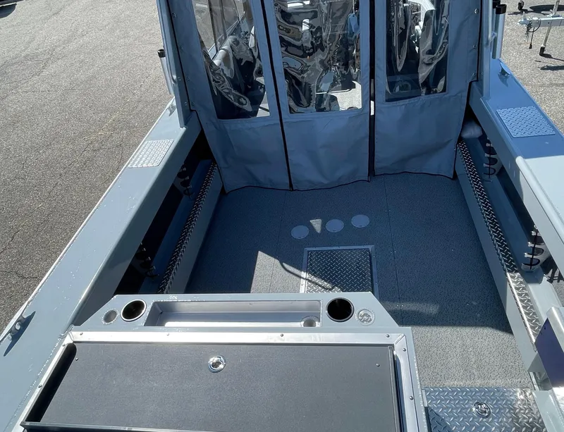 Slide: The Image of 2025 Hewescraft 210 Sea Runner ET HT boat interior with seating and storage compartments. - 4