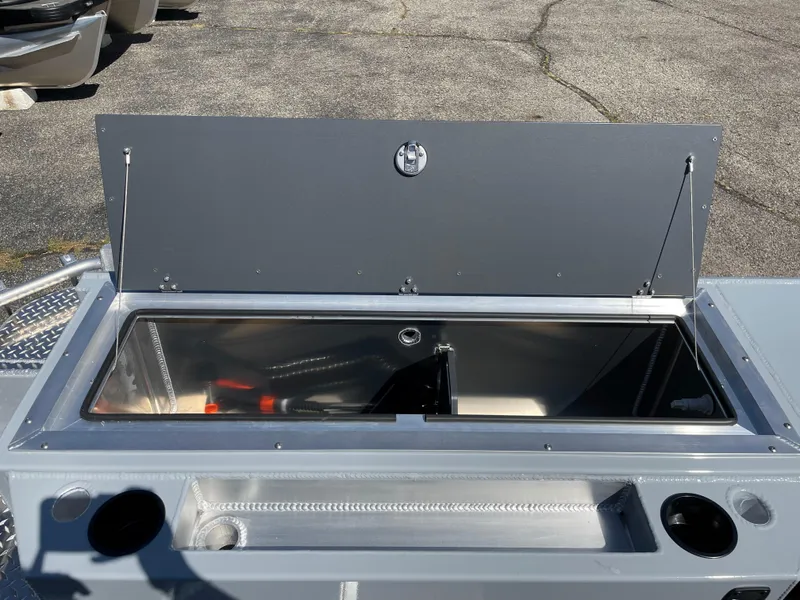 Slide: The Image of 2025 Hewescraft 210 Sea Runner ET HT boat storage compartment open on deck. - 7