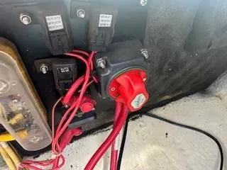Slide: The Image of Electrical panel with red wires and switches in a 2007 Chaparral 220 SSi boat. - 19