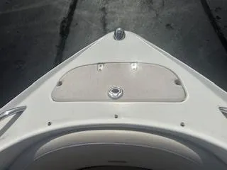 Slide: The Image of Bow view of a 2007 Chaparral 220 SSi boat, featuring a sleek design. - 4