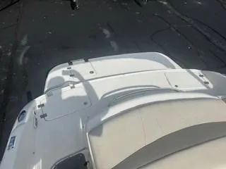 Slide: The Image of 2007 Chaparral 220 SSi boat, white deck, outdoor setting. - 8