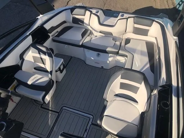 Slide: The Image of 2025 Yamaha Boats 195S interior with sleek seating and modern design. - 14