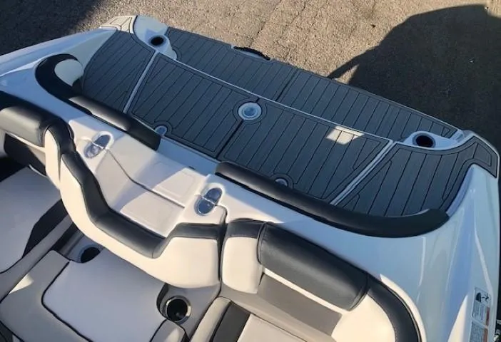 Slide: The Image of 2025 Yamaha Boats 195S interior with sleek seating and modern design. - 19
