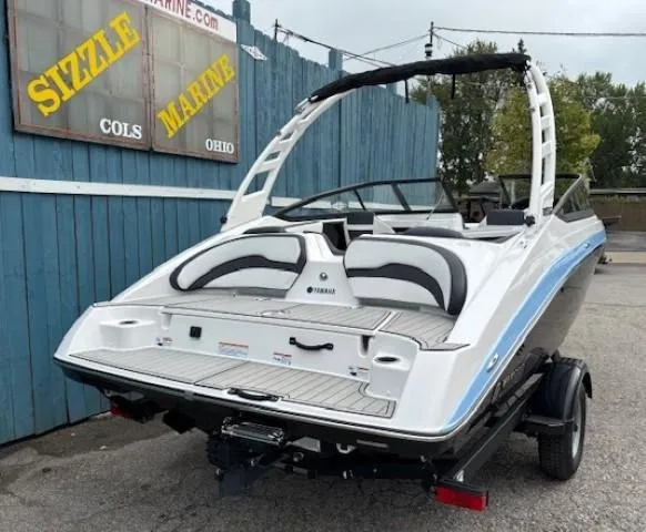 Slide: The Image of 2025 Yamaha Boats 195S on trailer, displayed at Sizzle Marine, Ohio. - 3