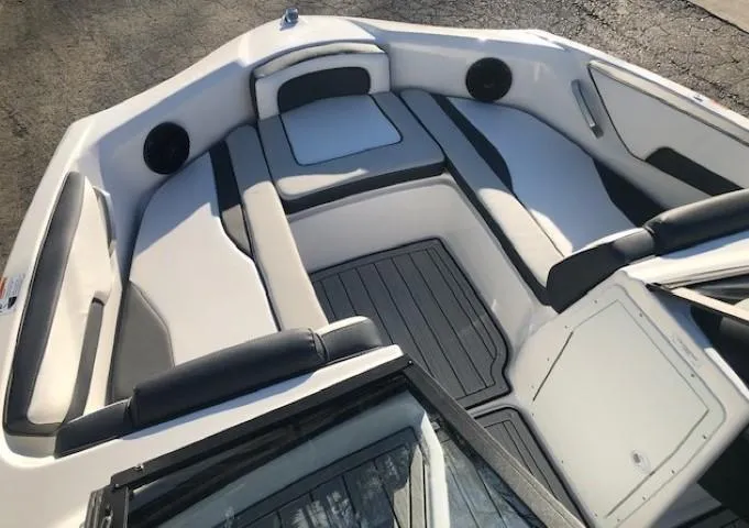 Slide: The Image of 2025 Yamaha Boats 195S interior with sleek seating and modern design. - 7