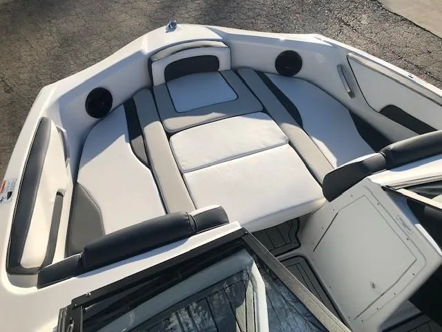 Slide: The Image of 2025 Yamaha Boats 195S interior, featuring spacious seating and modern design elements. - 8