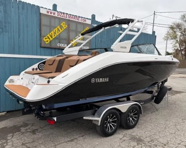Slide: The Image of 2025 Yamaha Boats 222S on trailer at Sizzle Marine dealership. - 3