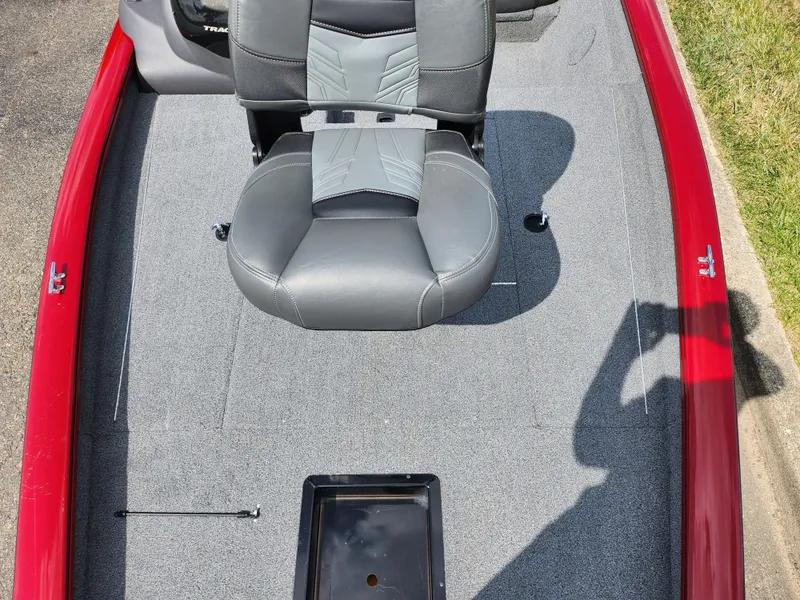 Slide: The Image of 2020 Tracker Pro Team 175 TXW boat interior with gray seating and red trim. - 16
