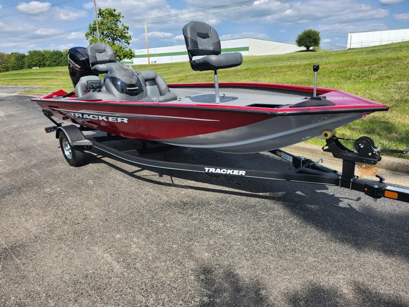 Slide: The Image of 2020 Tracker Pro Team 175 TXW fishing boat on trailer, parked outdoors. - 5