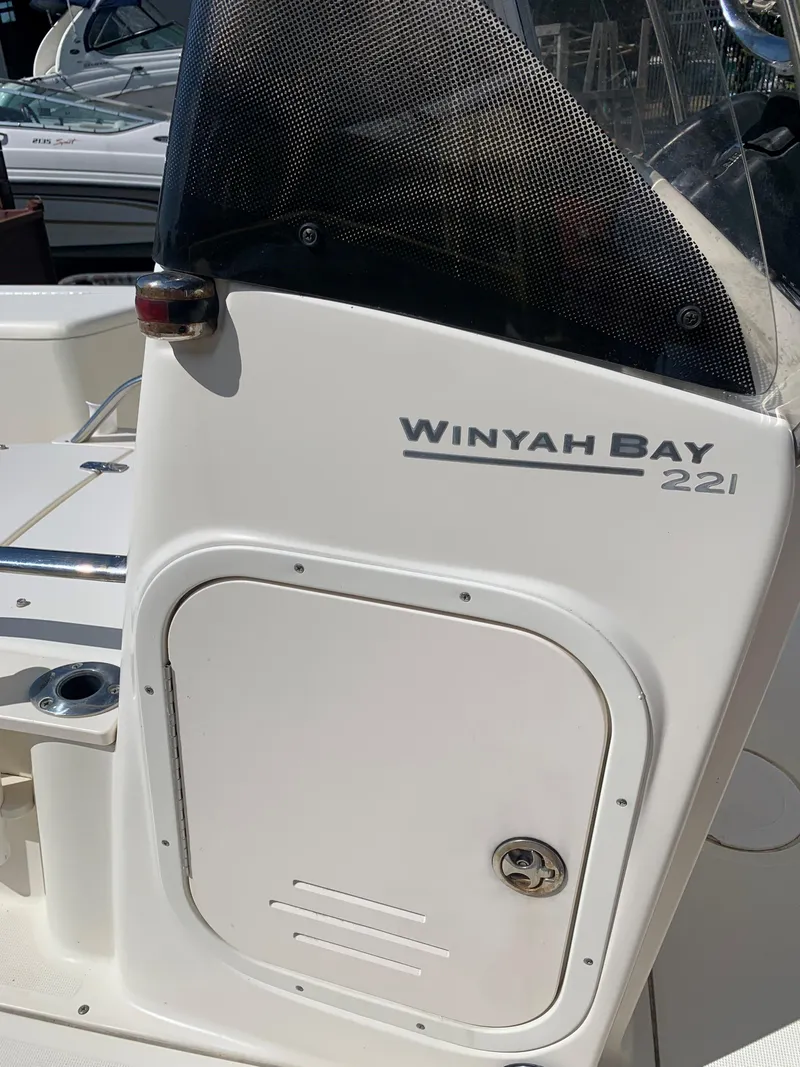 Slide: The Image of 2008 Scout 221 Winyah Bay boat console detail in sunlight. - 13