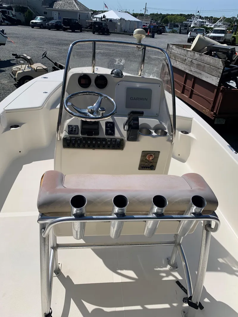 Slide: The Image of 2008 Scout 221 Winyah Bay boat console with Garmin GPS and rod holders. - 9