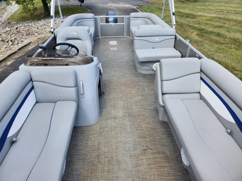 Slide: The Image of 2022 Bennington S 22 SSR pontoon boat with spacious seating and modern design. - 11