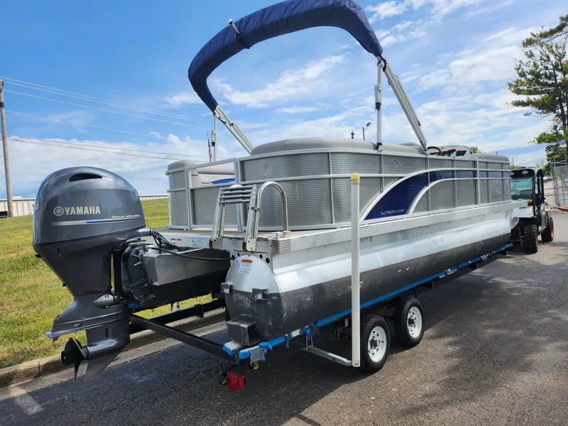 Slide: The Image of 2022 Bennington S 22 SSR pontoon boat with Yamaha motor on trailer. - 4