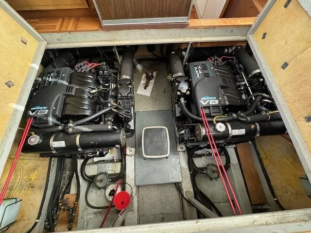 Slide: The Image of Engine room of a 1974 Tollycraft 40 Tri-Cabin with twin V8 engines. - 41