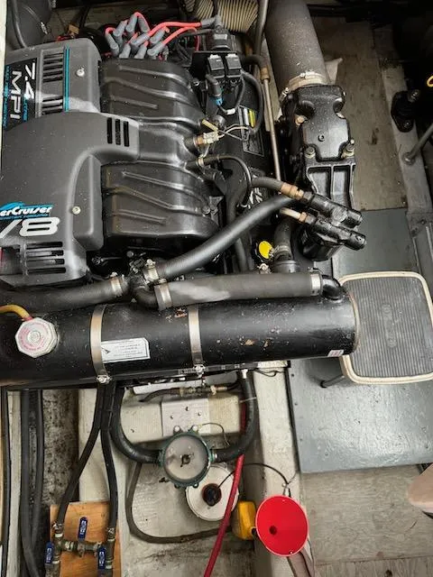 Slide: The Image of Engine compartment of a 1974 Tollycraft 40 Tri-Cabin boat with V8 engine. - 42