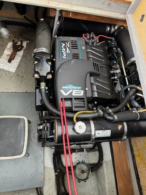 Slide: The Image of 1974 Tollycraft 40 Tri-Cabin engine compartment with MerCruiser V8 engine. - 44