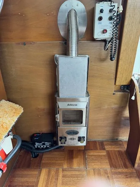 Slide: The Image of 1974 Tollycraft 40 Tri-Cabin interior with Dickinson heater and wood paneling. - 49