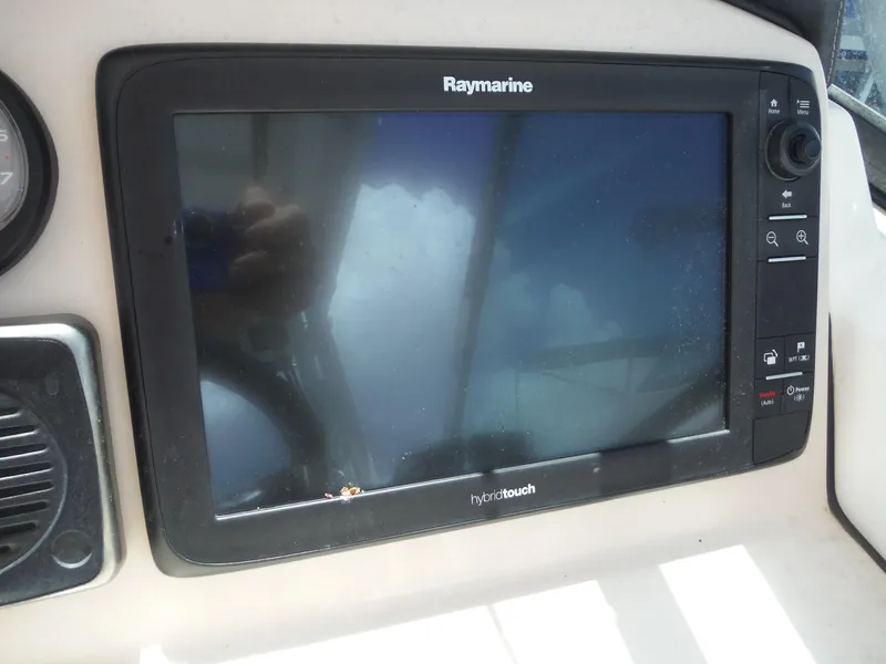 Slide: The Image of Raymarine display on 2015 Boston Whaler 270 Vantage boat dashboard. - 18