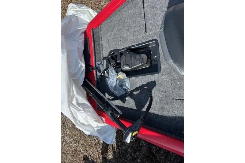 Slide: The Image of 2025 Tracker Pro Team 175 Crappie Edition boat interior with pedal and controls. - 91