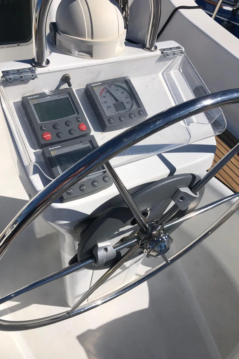 Slide: The Image of Beneteau 331 sailboat helm with navigation instruments, 2004 model. - 24