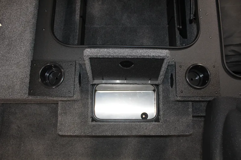 Slide: The Image of 2025 Tracker Pro Team 175 boat interior with storage compartments and cup holders. - 10