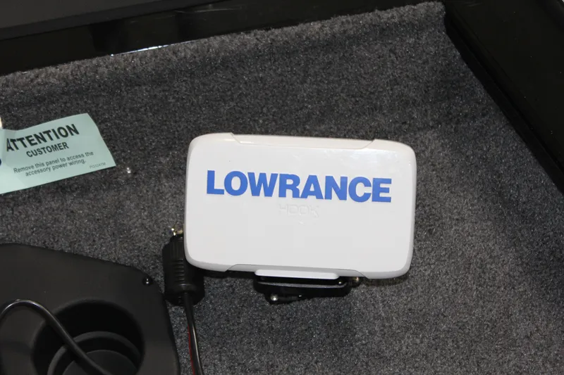 Slide: The Image of Lowrance device on 2025 Tracker Pro Team 175 boat carpet. - 3
