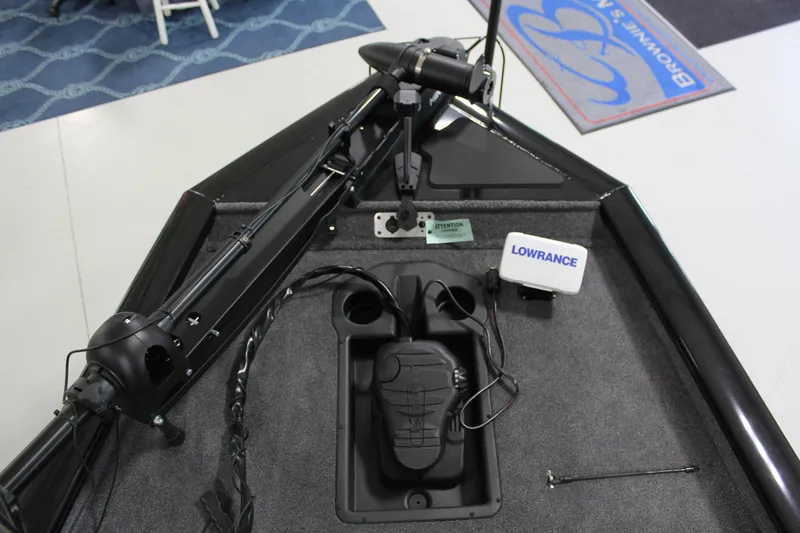 Slide: The Image of 2025 Tracker Pro Team 175 boat with Lowrance electronics and trolling motor setup. - 4