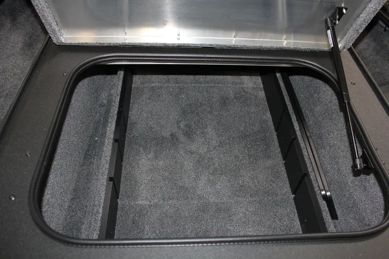 Slide: The Image of Open storage compartment in 2025 Tracker Pro Team 175 boat. - 9