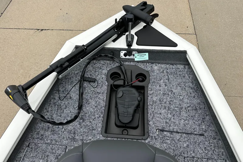 Slide: The Image of 2025 Tracker Pro Team 175 boat deck with trolling motor and foot pedal. - 3