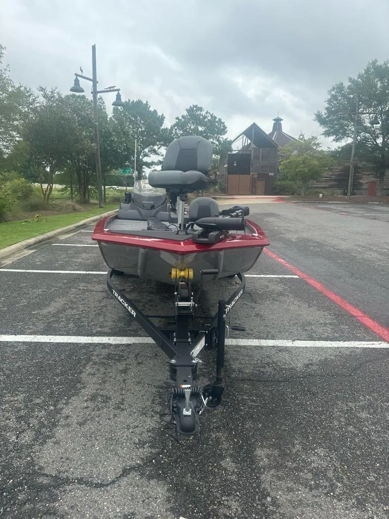 Slide: The Image of 2025 Tracker Pro 170 boat in parking lot, overcast day. - 3