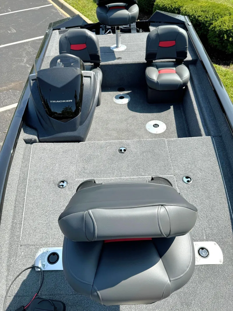 Slide: The Image of 2025 Tracker Pro Team 175 Crappie Edition boat with gray and red seating. - 4