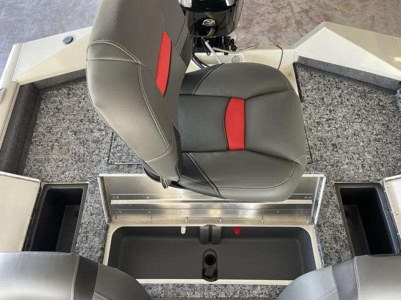 Slide: The Image of 2025 Tracker Pro Team 175 boat interior with gray and red seating. - 11