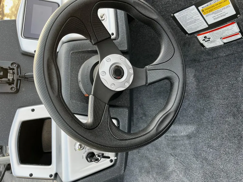 Slide: The Image of Steering wheel of 2025 Tracker Pro Team 175 Crappie Edition boat. - 2