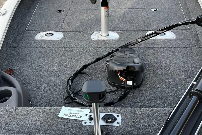 Slide: The Image of 2025 Tracker Pro Team 175 Crappie Edition boat interior with fishing equipment. - 5