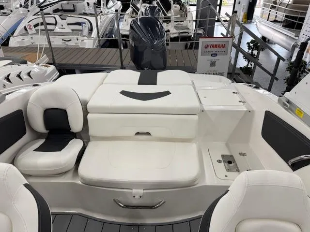 Slide: The Image of 2025 Chaparral 21 SSi Ski & Fish OB boat interior with seating and Yamaha engine. - 14