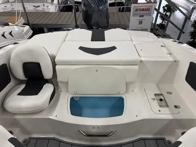 Slide: The Image of 2025 Chaparral 21 SSi Ski & Fish OB boat interior with seating and storage. - 15