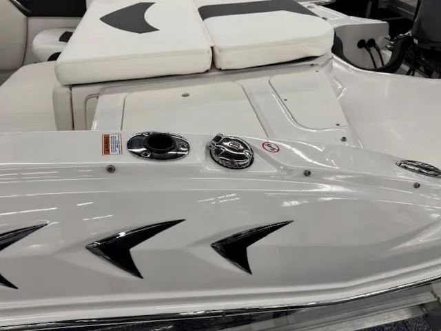 Slide: The Image of 2025 Chaparral 21 SSi Ski & Fish OB boat interior with sleek white seating and modern design. - 18
