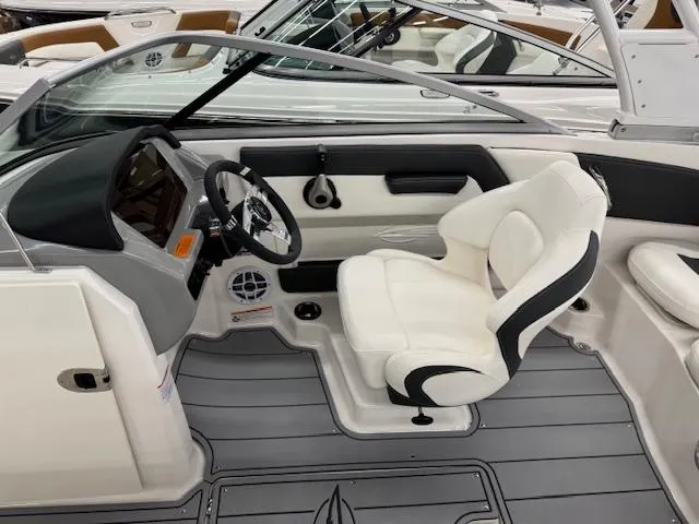 Slide: The Image of 2025 Chaparral 21 SSi Ski & Fish OB boat interior with sleek design and comfortable seating. - 7