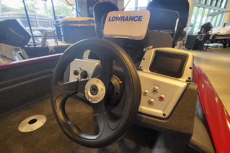 Slide: The Image of 2025 Tracker Pro Team 175 Crappie Edition boat dashboard with Lowrance electronics. - 3