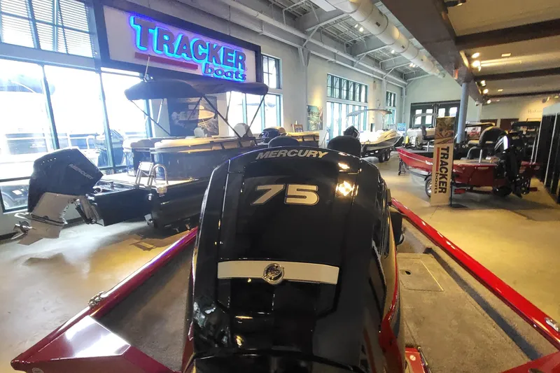 Slide: The Image of 2025 Tracker Pro Team 175 Crappie Edition boat in showroom with Mercury 75 engine. - 4