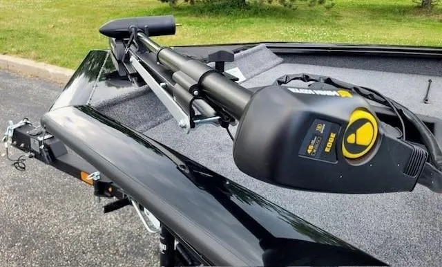 Slide: The Image of 2025 Tracker Pro Team 175 boat with trolling motor on trailer. - 3