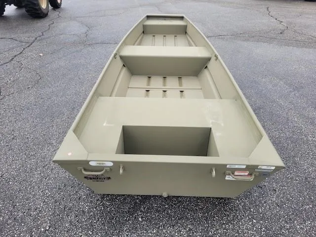 Slide: The Image of 2025 Tracker Grizzly 1436 Utility boat on asphalt surface, showcasing interior seating and storage. - 2