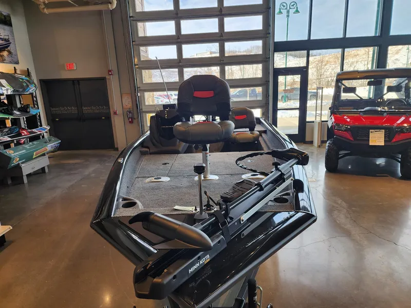 Slide: The Image of 2025 Tracker Pro Team 175 Crappie Edition boat displayed indoors. - 2