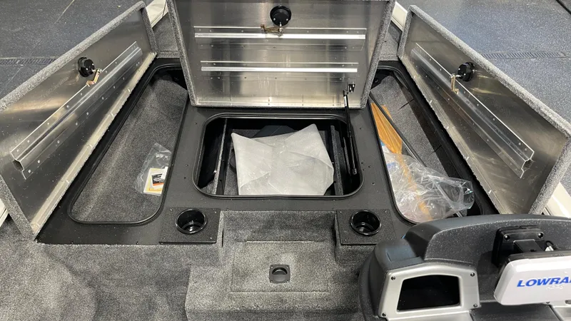 Slide: The Image of 2025 Tracker Pro Team 175 boat storage compartments with Lowrance electronics. - 10