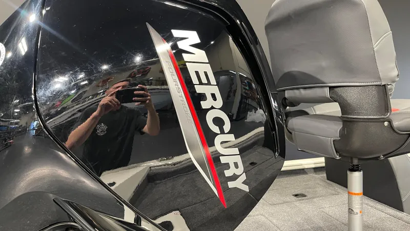 Slide: The Image of Mercury engine on 2025 Tracker Pro Team 175 boat, interior view. - 5
